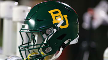 Oct 29, 2022; Lubbock, Texas, USA;  A general view of a Baylor Bears helmet on the bench in the second half during the game against the Texas Tech Red Raiders at Jones AT&T Stadium and Cody Campbell Field. Mandatory Credit: Michael C. Johnson-Imagn Images