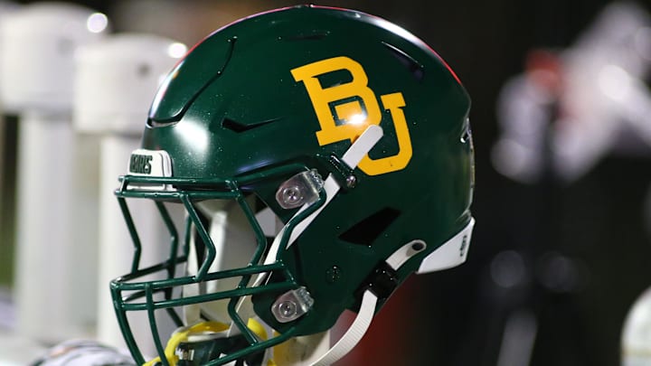 Oct 29, 2022; Lubbock, Texas, USA;  A general view of a Baylor Bears helmet on the bench in the second half during the game against the Texas Tech Red Raiders at Jones AT&T Stadium and Cody Campbell Field. Mandatory Credit: Michael C. Johnson-Imagn Images
