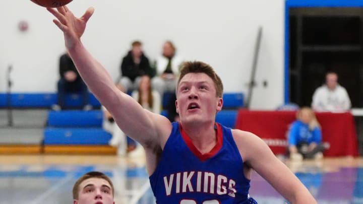 Wisconsin Lutheran's Kon Knueppel (33) drives in for a layup during the game at Brookfield Central on Tuesday, Nov. 28, 2023. Wisconsin Lutheran won the game 73-47.