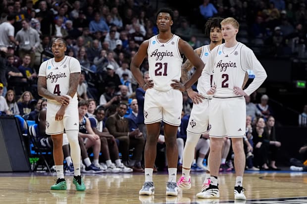 Texas A&M Aggies guard Wade Taylor IV (4), forward Pharrel Payne (21), guard Hayden Hefner (2) and forward Andersson Garcia, 