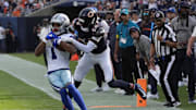 Sep 21, 2025; Chicago, Illinois, USA; Chicago Bears cornerback Nahshon Wright (26) tackles Dallas Cowboys wide receiver Jalen Tolbert (1) during the first half at Soldier Field. Mandatory Credit: David Banks-Imagn Images