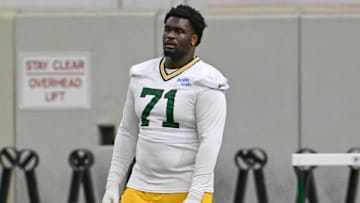 Jun 11, 2025; Green Bay, WI, USA;  Green Bay Packers offensive tackle Anthony Belton (71) participates in the team's minicamp at Ray Nitschke Field. 