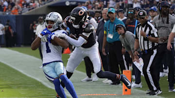 Sep 21, 2025; Chicago, Illinois, USA; Chicago Bears cornerback Nahshon Wright (26) tackles Dallas Cowboys wide receiver Jalen Tolbert (1) during the first half at Soldier Field. Mandatory Credit: David Banks-Imagn Images
