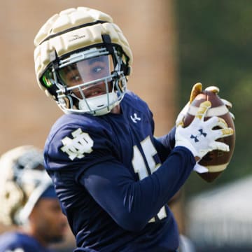 Notre Dame cornerback Leonard Moore catches a ball during a Notre Dame football practice at Irish Athletic Center on Wednesday, July 31, 2024, in South Bend.