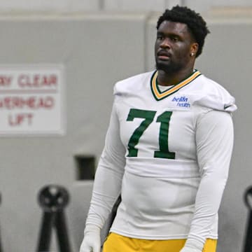 Jun 11, 2025; Green Bay, WI, USA;  Green Bay Packers offensive tackle Anthony Belton (71) participates in the team's minicamp at Ray Nitschke Field. Mandatory Credit: Benny Sieu-Imagn Images
