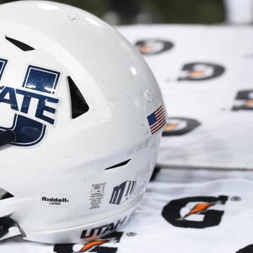 Sep 4, 2021; Pullman, Washington, USA; Utah State Aggies helmet sits during a game against the Washington State Cougars in the second half at Gesa Field at Martin Stadium. The Aggies26-23. Mandatory Credit: James Snook-USA TODAY Sports