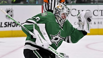 Jan 24, 2025; Dallas, Texas, USA; Dallas Stars goaltender Jake Oettinger (29) makes a glove save against the Vegas Golden Knights during the third period at the American Airlines Center. Mandatory Credit: Jerome Miron-Imagn Images
