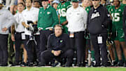 Dec 21, 2023; Boca Raton, FL, USA;  South Florida Bulls head coach Alex Golesh looks on as time expires against the Syracuse Orange in the fourth quarter during the RoofClaim.com Boca Raton Bowl at FAU Stadium. Mandatory Credit: Nathan Ray Seebeck-Imagn Images