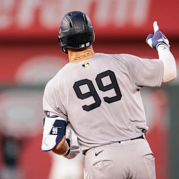 Kansas City, Missouri, USA; New York Yankees outfielder Aaron Judge (99) rounds bases after hitting a home run during the seventh inning against the Kansas City Royals at Kauffman Stadium.