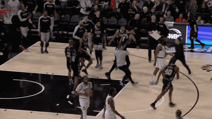 Spurs center Wembanyama charges at Clippers center Zubac after a shove in the back