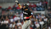 Aug 8, 2025; Cumberland, Georgia, USA; Miami Marlins designated hitter Heriberto Hernandez (64) hits a two run home run against the Atlanta Braves during the fifth inning at Truist Park. Mandatory Credit: Mady Mertens-Imagn Images