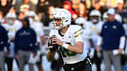 Nov 15, 2025; Chestnut Hill, Massachusetts, USA; Georgia Tech Yellow Jackets quarterback Haynes King (10) looks to pass the ball during the first half against the Boston College Eagles at Alumni Stadium. Mandatory Credit: Bob DeChiara-Imagn Images