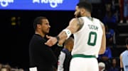 Mar 31, 2025; Memphis, Tennessee, USA; Boston Celtics head coach Joe Mazzulla talks with Boston Celtics forward Jayson Tatum (0) during the fourth quarter against the Memphis Grizzlies at FedExForum. Mandatory Credit: Petre Thomas-Imagn Images