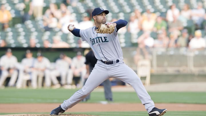 Seattle Mariners pitcher Miguel Batista (43) delivers a pitch against the Oakland Athletics during the first inning at McAfee Coliseum in Oakland, CA.