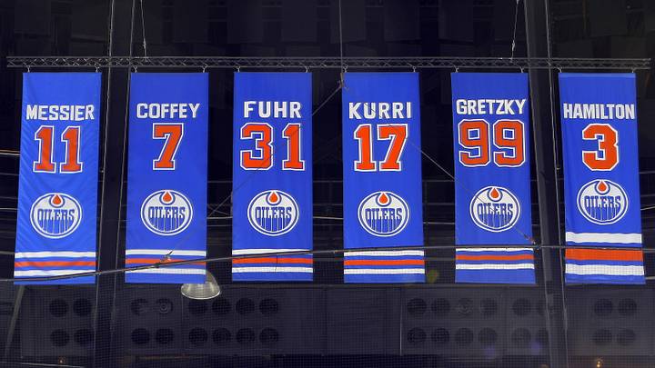 Jan 20, 2009; Edmonton, AB, Canada; Retired numbers of former Edmonton Oilers players hang from the rafters after the game against the Columbus Blue Jackets at Rexall Place. From left to right are center Mark Messier (11), defenseman Paul Coffey (7), goalie Grant Fuhr (31), right wing Jari Kurri (17), center Wayne Gretzky (99) and defenseman Al Hamilton (3). Mandatory Credit: Tom Szczerbowski-USA TODAY Sports