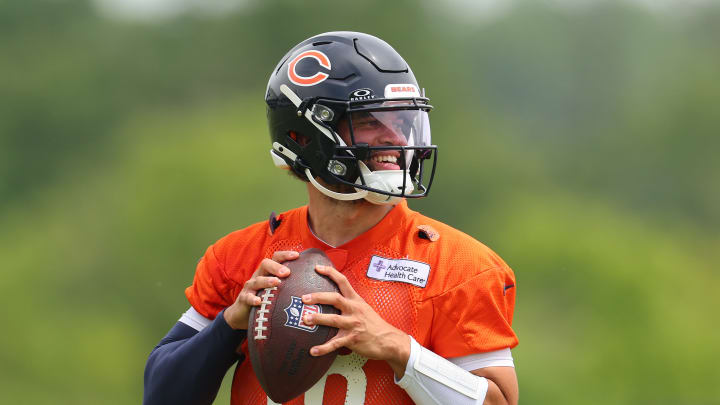 LAKE FOREST, ILLINOIS - JUNE 04: Caleb Williams #18 of the Chicago Bears throws a pass during Chicago Bears Minicamp at Halas Hall on June 04, 2024 in Lake Forest, Illinois.