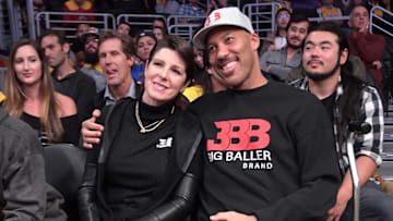 Lavar Ball and wife Tina wear Big Baller Brand apparel during an game between the Los Angeles Lakers and the Detroit Pistons.