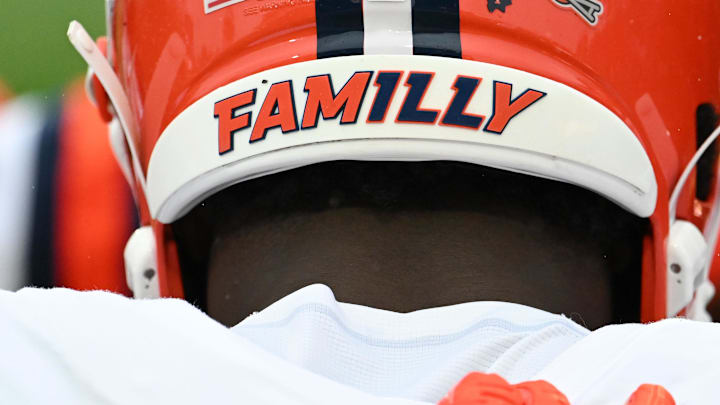 Oct 14, 2023; College Park, Maryland, USA;  Illinois Fighting Illini linebacker Gabe Jacas (17) huddles along the sidelines with teammates before the game against the Maryland Terrapins at SECU Stadium. Mandatory Credit: Tommy Gilligan-Imagn Images