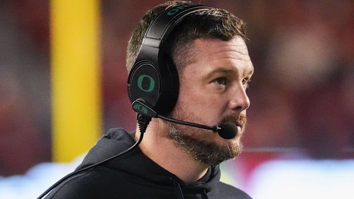 Nov 16, 2024; Madison, Wisconsin, USA;  Oregon Ducks head coach Dan Lanning looks on during the first quarter against the Wisconsin Badgers at Camp Randall Stadium. Mandatory Credit: Jeff Hanisch-Imagn Images