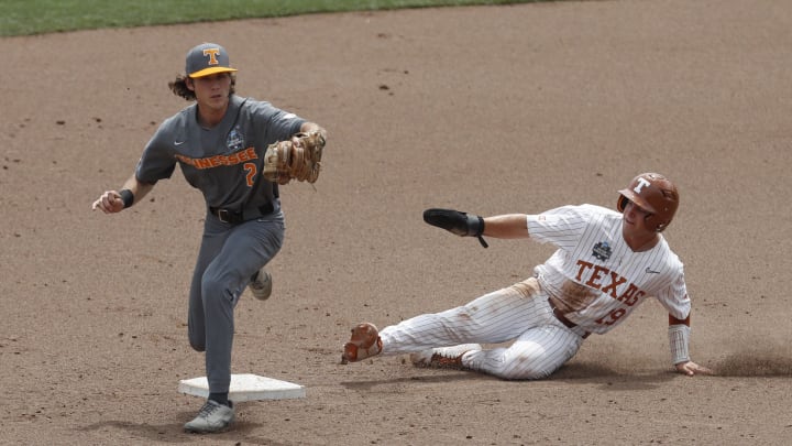 Jun 22, 2021; Omaha, Nebraska, USA;  Tennessee Volunteers second baseman Max Ferguson (2) can t make