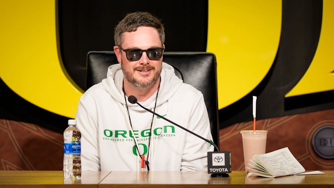 Oregon head coach Dan Lanning speaks from the podium at the Hatfield-Dowlin Complex on the first day of spring practice for the Oregon Ducks on March 12, 2026, in Eugene, Oregon.