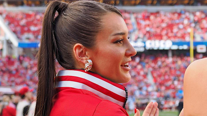 Kristin Juszczyk wears a custom made jacket in show of her support for her husband San Francisco 49ers fullback Kyle Juszczyk.