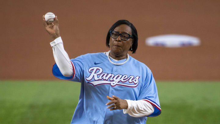 Mavericks CEO Cynt Marshall throws out the first pitch before a Texas Rangers game in 2022