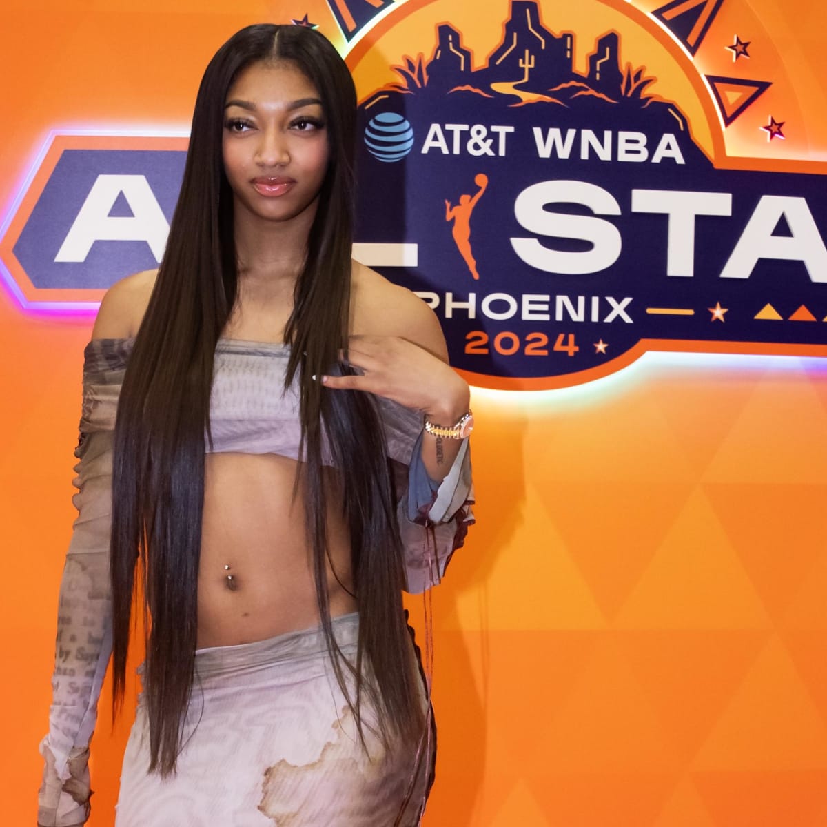 Angel Reese channels Paris chic in hot-pink Balenciaga courtside before Olympics