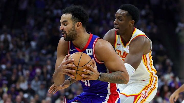 Nov 18, 2024; Sacramento, California, USA; Sacramento Kings forward Trey Lyles (41) and Atlanta Hawks forward Onyeka Okongwu (17) fight for a rebound during the second quarter at Golden 1 Center. Mandatory Credit: Sergio Estrada-Imagn Images