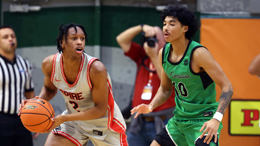 Jan 2, 2026; Mesa, AZ, USA; Arizona Compass Prep guard Kaden House (10) defends against Spire Institute (OH) guard King Gibson (2) during the HoopHall West Tournament at Skyline High School. Mandatory Credit: Mark J. Rebilas-Imagn Images