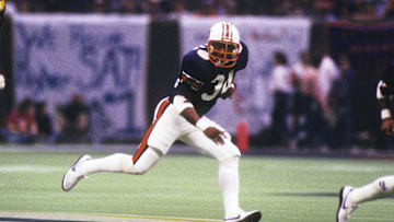 Auburn Tigers running back Bo Jackson carries the ball against the Michigan Wolverines during the 1984 Sugar Bowl. He was named MVP of the game. 
