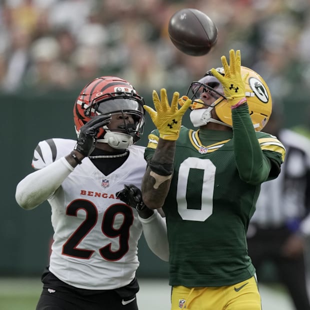 Green Bay Packers wide receiver Matthew Golden (0) makes a 45-yard reception while being covered by Cam Taylor-Britt.