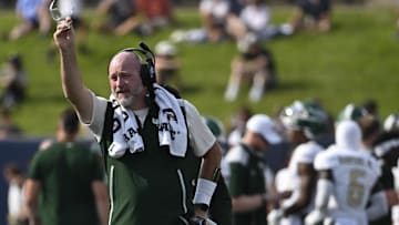 Sep 6, 2025; Annapolis, Maryland, USA;  UAB Blazers head coach Trent Dilfer signals during the first half against the Navy Midshipmen at Navy-Marine Corps Memorial Stadium. Mandatory Credit: Tommy Gilligan-Imagn Images