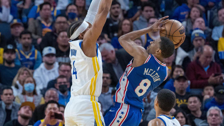 Mar 24, 2023; San Francisco, California, USA;  Philadelphia 76ers guard De'Anthony Melton (8) shoots the basketball over Golden State Warriors guard Moses Moody (4) during the fourth quarter at Chase Center. Mandatory Credit: Neville E. Guard-USA TODAY Sports