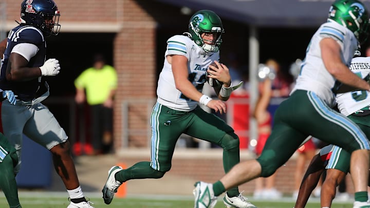Tulane quarterback Jake Retzlaff runs the ball earlier this season. The Green Wave host North Texas in the American title game on Friday.