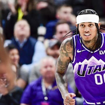 Mar 4, 2024; Salt Lake City, Utah, USA; Utah Jazz guard Jordan Clarkson (00) reacts after a basket agains the Washington Wizards during the first half at the Delta Center. Mandatory Credit: Christopher Creveling-Imagn Images