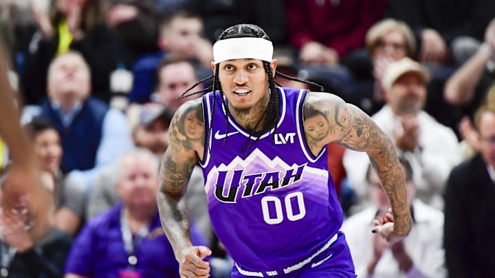 Mar 4, 2024; Salt Lake City, Utah, USA; Utah Jazz guard Jordan Clarkson (00) reacts after a basket agains the Washington Wizards during the first half at the Delta Center. Mandatory Credit: Christopher Creveling-Imagn Images