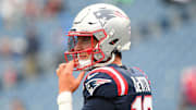 Sep 7, 2025; Foxborough, Massachusetts, USA; New England Patriots quarterback Tommy DeVito (16) practices before the game against the Las Vegas Raiders at Gillette Stadium.  