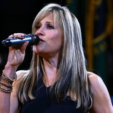 Mar 11, 2015; Phoenix, AZ, USA; WWE ring announcer Lilian Garcia sings the national anthem prior to the game between the Minnesota Timberwolves against the Phoenix Suns at US Airways Center. Mandatory Credit: Mark J. Rebilas-USA TODAY Sports