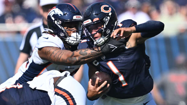 Denver Broncos rush linebacker sacks Chicago Bears quarterback Justin Fields. 