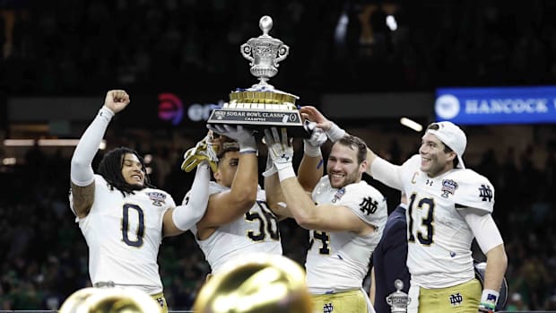 Notre Dame captains celebrate winning the Sugar Bowl over Georgi