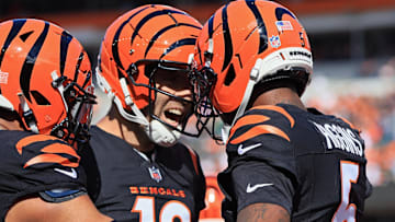 Oct 26, 2025; Cincinnati, Ohio, USA; Cincinnati Bengals wide receiver Tee Higgins (5) celebrates after scoring a touchdown with quarterback Joe Flacco (16) during the second quarter against the New York Jets at Paycor Stadium. Mandatory Credit: Katie Stratman-Imagn Images