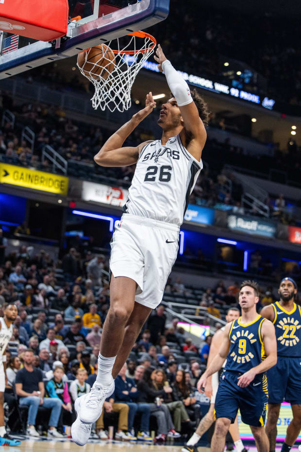 San Antonio Spurs forward Dominick Barlow (26) shoots the ball in the second half against the Indiana Pacers.