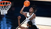 Vanderbilt Commodores guard Jason Edwards (1) is fouled by Maryland-Eastern Shore Hawks guard Ralph Martino Jr. (1) on the shot during their game at Memorial Gym in Nashville, Tenn., Monday, Nov. 4, 2024.