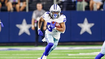 Aug 22, 2025; Arlington, Texas, USA; Dallas Cowboys running back Jaydon Blue (34) carries the ball during the fourth quarter against the Atlanta Falcons at AT&T Stadium. Mandatory Credit: Andrew Dieb-Imagn Images