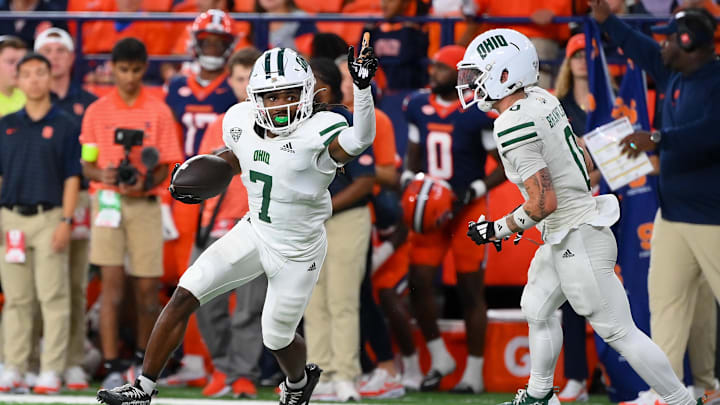 Aug 31, 2024; Syracuse, New York, USA; Ohio Bobcats cornerback Tank Pearson (7) reacts after making an interception against the Syracuse Orange during the second half at the JMA Wireless Dome. Mandatory Credit: Rich Barnes-Imagn Images