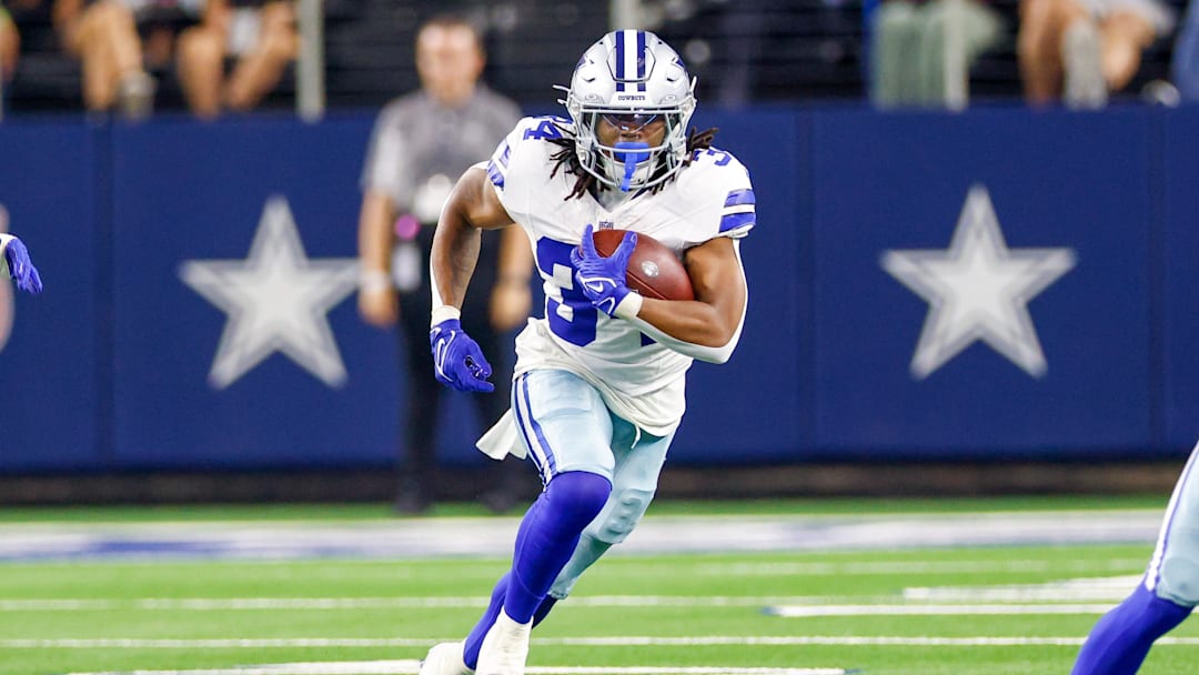 Aug 22, 2025; Arlington, Texas, USA; Dallas Cowboys running back Jaydon Blue (34) carries the ball during the fourth quarter against the Atlanta Falcons at AT&T Stadium. Mandatory Credit: Andrew Dieb-Imagn Images