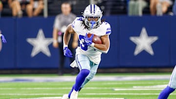 Aug 22, 2025; Arlington, Texas, USA; Dallas Cowboys running back Jaydon Blue (34) carries the ball during the fourth quarter against the Atlanta Falcons at AT&T Stadium. Mandatory Credit: Andrew Dieb-Imagn Images