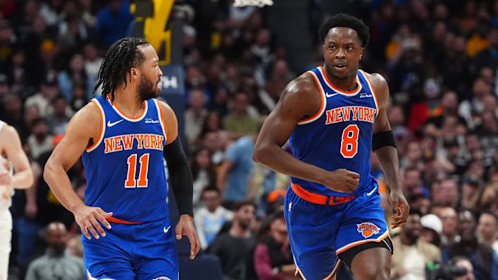 Nov 25, 2024; Denver, Colorado, USA; New York Knicks guard Jalen Brunson (11) reacts towards forward OG Anunoby (8) in the second quarter against the Denver Nuggets at Ball Arena. Mandatory Credit: Ron Chenoy-Imagn Images Nov 25, 2024; Denver, Colorado, USA; New York Knicks guard Jalen Brunson (11) reacts towards forward OG Anunoby (8) in the second quarter against the Denver Nuggets at Ball Arena. Mandatory Credit: Ron Chenoy-Imagn Images