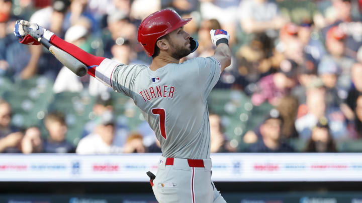 Jun 24, 2024; Detroit, Michigan, USA;  Philadelphia Phillies shortstop Trea Turner (7) hits a double in the first inning against the Detroit Tigers at Comerica Park.